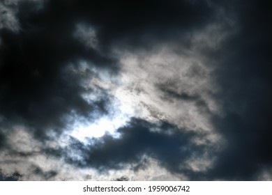 490 Sun hiding behind dark clouds Images, Stock Photos & Vectors ...