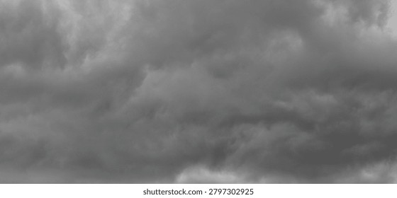 Dramatic Dark Storm Clouds in Overcast Sky Before Heavy Rain, Moody Monochrome Cumulus Cloudscape Background. 