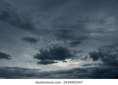 Dramatic dark storm rain clouds black sky background. Dark thunderstorm clouds rainny atmosphere. Meteorology danger windstorm disasters climate. Dark cloudscape storm disaster gloomy gray cloud sky - Powered by Shutterstock