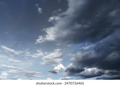 Dramatic dark storm rain clouds black sky background. Dark thunderstorm clouds rainny atmosphere. Meteorology danger windstorm disasters climate. Dark cloudscape storm disaster gloomy gray cloud sky - Powered by Shutterstock