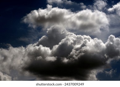 Dramatic dark storm thundercloud rain clouds on black sky background. Dark thunderstorm clouds rainny landscape. Meteorology danger windstorm disaster climate. Dark cloudscape storm disaster gray sky