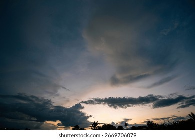 Dramatic dark storm thundercloud rain clouds on black sky background. Dark thunderstorm clouds rainny landscape. Meteorology danger windstorm disaster climate. Dark cloudscape storm disaster gray sky