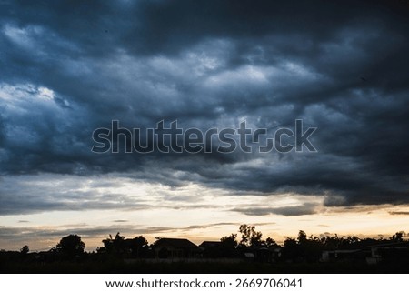 Dramatic dark storm thundercloud rain clouds on black sky background. Dark thunderstorm clouds rainny landscape. Meteorology danger windstorm disaster climate. Dark cloudscape storm disaster gray sky