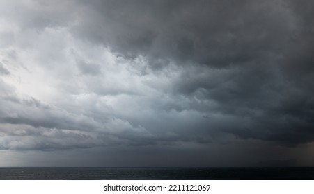 Dramatic Dark Stormy Sky Over Sea Water, Natural Photo Background