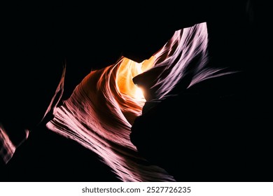 Dramatic dark and textured lighting on sandstone canyon walls.