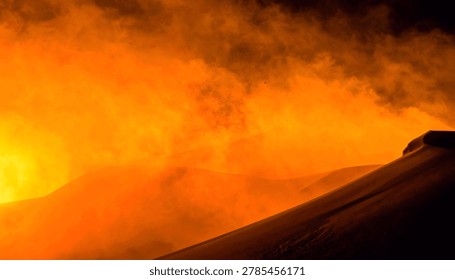 Dramatic desert landscape featuring orange dunes and haze creating an abstract surreal and atmospheric vista.