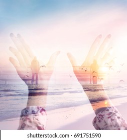Dramatic double exposure effects on silhouette hands combined with photograph of lonely people on the ocean bridge during the sunset. Conceptual, abstract. Loneliness, freedom, dreaming, love, destiny