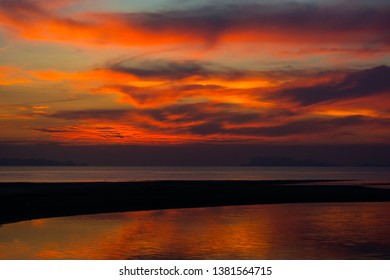DRAMATIC DUSK TWILIGHT CLOUD SKY OVER WATER OVER WATER SCENIC LOOK OUT FROM SEASIDE