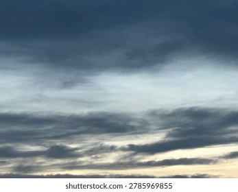 Dramatic evening clouds creating atmospheric natural sky background and outdoor weather environment at sunset