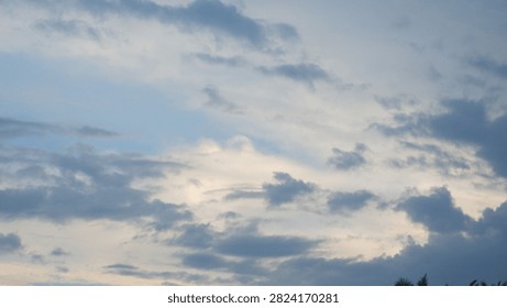 Dramatic Evening Clouds over Tropical Palm Tree Silhouettes
