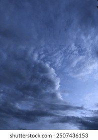 Dramatic Evening Sky with Blue Clouds – Captivating Nature Photography