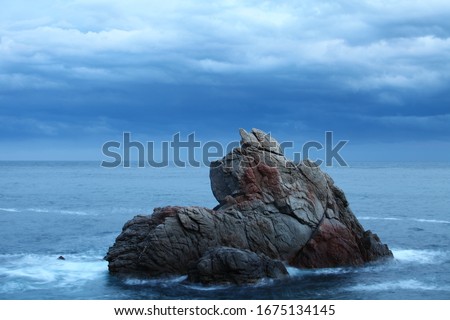 Dramatic featuring scenic rock formations,  seascape