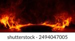 Dramatic fire and smoke effect glowing red and yellow colors exploding outwards with center space. Vivid and hot hell abstract or blazing fire background or wallpaper