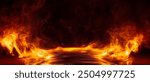 Dramatic fire and smoke effect glowing red and yellow colors exploding outwards with center space. Vivid and hot hell abstract or blazing fire background or wallpaper