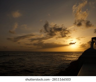 Dramatic Golden Hour Sunset and Clouds above the sea, France