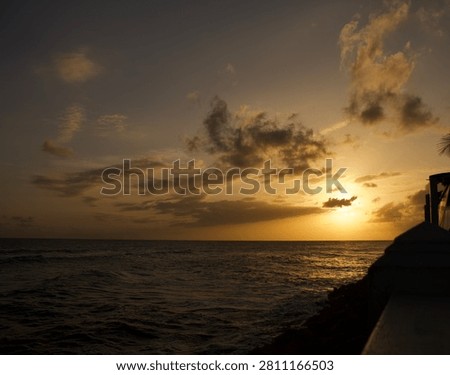 Dramatic Golden Hour Sunset and Clouds above the sea, France