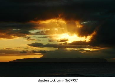 Dramatic Hawaiian Sunset Over The Island Of Ni'ihau, Taken From A Beach In Kauai.