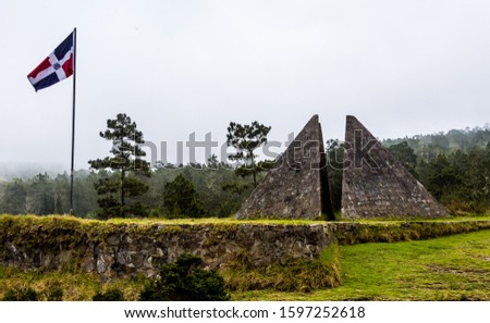 dramatic image of a stone pyramid high in the caribbean mountains of the dominican republic at the national park Valle Nuevo.