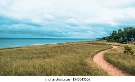 Dramatic Landscape Of Lake Michigan Dunes And Beach In New Buffalo Michigan.  Sandy Foot Path Leading To The Beach Before It Rains.