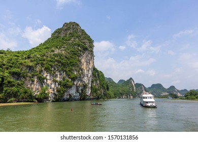Dramatic landscape of limestone karst besides Li river which flows from Guilin to Yangshuo in China. 