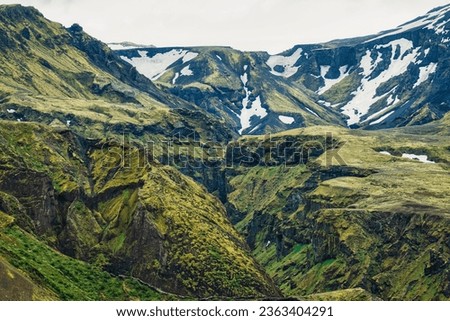 Dramatic landscape of lush rugged volcanic mountain in summer on Icelandic highlands at Thorsmork, Iceland
