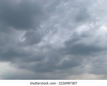 Dramatic landscape of stormy sky Nimbostratus Clouds A gray Style rolls and Huge scary storm it's going to rain heavily at Bangkok, Thailand.no focus