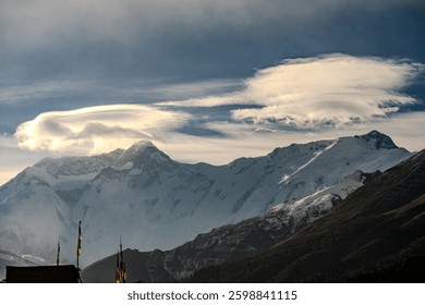 Dramatic Lenticular Clouds Over Snow-Capped Annapurna Peaks in T