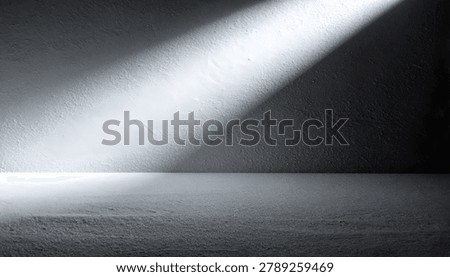 Dramatic light beam on bright surface. Spotlit concrete floor and stucco wall modern design for product display template.