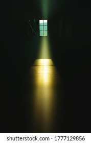 Dramatic light ray through window