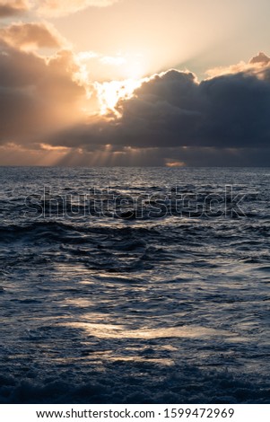 Similar – Image, Stock Photo Sunrise over Ocean Through Black Window Panes