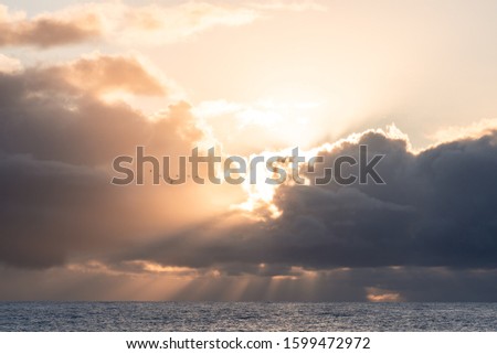 Similar – Image, Stock Photo Sunrise over Ocean Through Black Window Panes