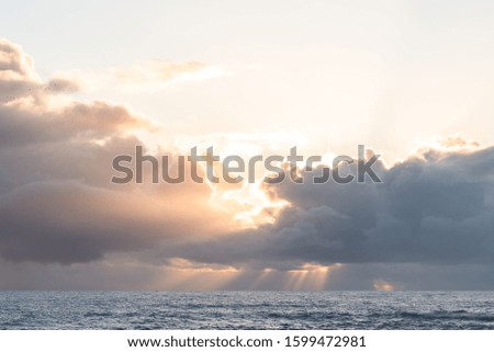 Similar – Image, Stock Photo Sunrise over Ocean Through Black Window Panes