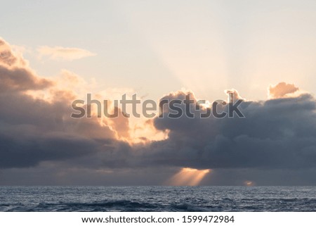 Similar – Image, Stock Photo Sunrise over Ocean Through Black Window Panes