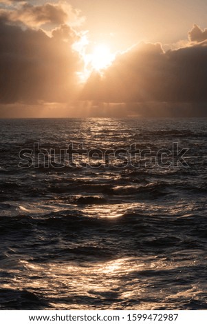 Similar – Image, Stock Photo Sunrise over Ocean Through Black Window Panes