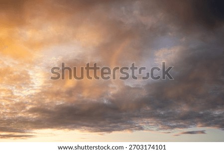 Dramatic Light Speckled Rain Clouds