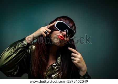 Dramatic Lighting Female with Sunglasses and Hair