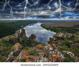 Dramatic lightning illuminates a deep river canyon under a powerful, dark, stormy sky