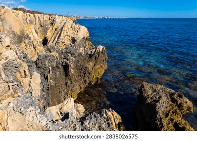 Dramatic Limestone Cliffs and Clear Blue Ocean in Western Australia