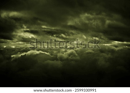 A dramatic look of the inbetween of clouds up in the sky