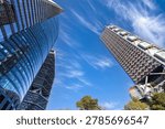 A dramatic low angle perspective of modern corporate business skyscrapers and financial district office buildings on Reforma Avenue in Mexico City Mexico
