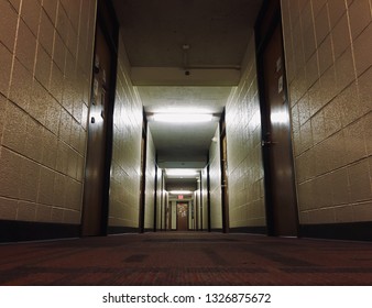 Dramatic Low-angle Looking Down College Dorm Hallway