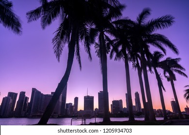 Dramatic Miami Skyline At Dusk Over Water With Bridge 