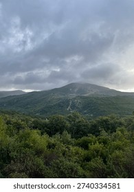 Dramatic Mountain Landscape Under Cloudy Skies