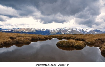 Dramatic mountain landscape under cloudy sky