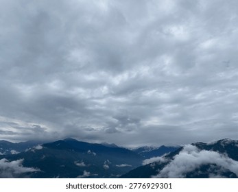 Dramatic Mountain Landscape under Stormy Overcast Sky
