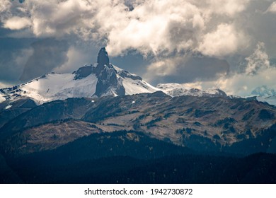 Dramatic mountain peak in clouds