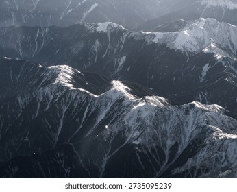 Dramatic Mountain Range Seen from Airplane, Aerial Landscape