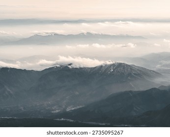 Dramatic Mountain Range Seen from Airplane, Aerial Landscape