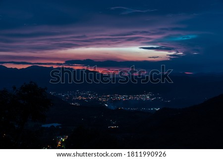 dramatic night landscape of Ocoa, Dominican Republic in the caribbean mountains at sunset.