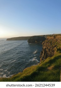 Dramatic Ocean Cliffs
Towering above the wild Atlantic, these ancient cliffs stand as nature’s fortress—carved by wind and time. Waves crash violently against the rocks below, sending up sprays 